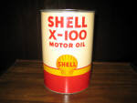 Shell X-100 Motor Oil, 5 qt round can, c.1951, small ding on back side along top rim, light top side surface rust, paint in great condition, EMPTY, $245.  