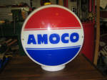Amoco gas globe,(American Oil Company, Troy, New York) 1940s, on original 12.5 inch wide glass body, still has original grout around lenses, $850. 