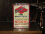 Russolene Brand Motor Oil 1 gallon can, EXCELLENT condition, 1920s vintage, has 2 lubrication charts for various old automobiles on 2 narrow side panels.  [SOLD]