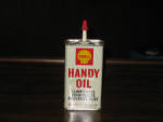 Shell Handy Oil tin with appliances on the side, vintage, has a little marker staining under the red HA, FULL, $41.50. 