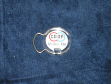 COOP Motor Oil key chain, has tiny crack in plastic, $10 as-is.  