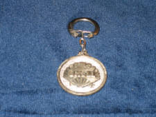 Shell metal key chain, $28.  
