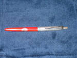 Standard red and silver ballpoint pen, 1960s, slightly bent, $5.  