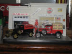 Clark model garage, comes with tanker truck bank, oil case pick-up truck, and original boxes, $165.  
